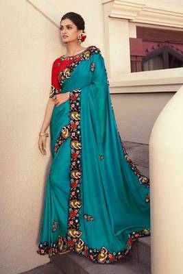 Turquoise embroidered silk saree with blouse 1