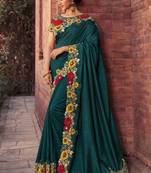 Dark teal embroidered silk saree with blouse