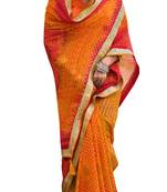 Orange printed pure georgette saree with blouse