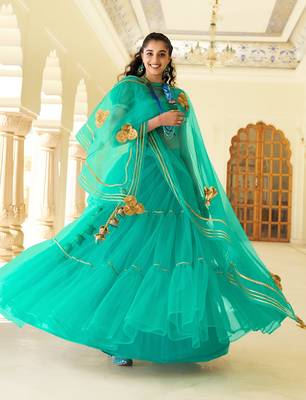 Green embroidered net semi stitched lehenga 2