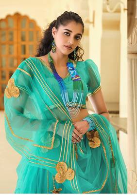 Green embroidered net semi stitched lehenga 3