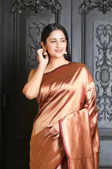 Maroon woven silk blend saree with blouse