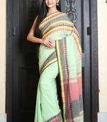 Light green woven cotton saree with blouse
