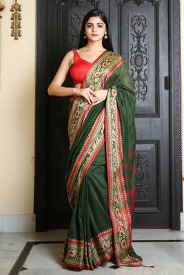 Green woven blended cotton saree with blouse 1