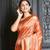 Dark orange woven silk saree with blouse