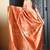Dark orange woven silk saree with blouse