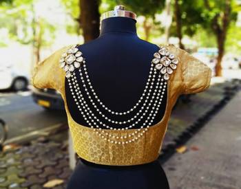 White brooch 1