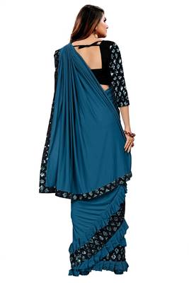 Teal plain lycra saree with blouse 3