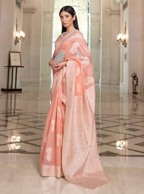 Peach woven silk blend saree with blouse 1