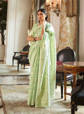 Light green woven silk blend saree with blouse 1
