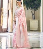 Light pink woven silk blend saree with blouse