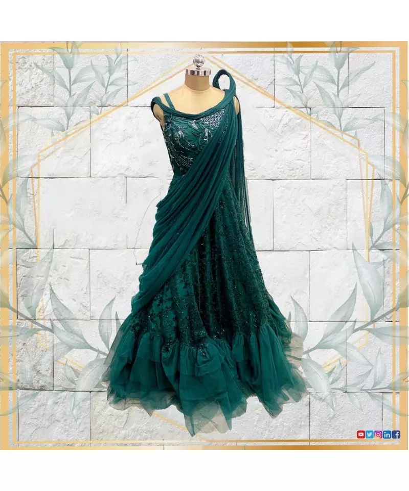 Draped saree look green gown with shimmers and embroidery