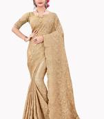 Beige plain chiffon saree with blouse