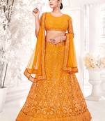 Mustard embroidered net semi stitched lehenga
