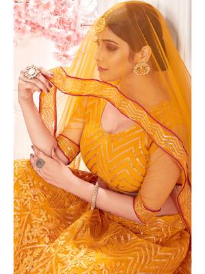 Mustard embroidered net semi stitched lehenga 3