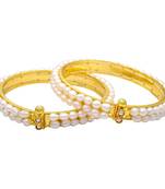 White pearl bangles-and-bracelets
