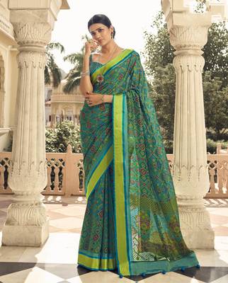 Teal printed brasso saree with blouse 1