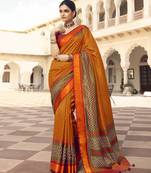 Dark orange printed brasso saree with blouse