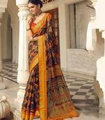 Orange printed brasso saree with blouse
