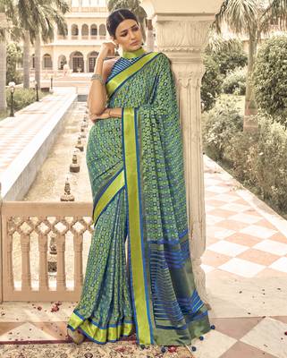 Turquoise printed brasso saree with blouse 1