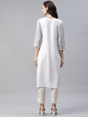 Cream printed viscose rayon kurtas-and-kurtis 3