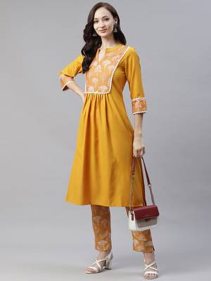 Mustard printed viscose rayon kurtas-and-kurtis 5