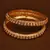 Gold plated gheru stone embellished copper made  bangles BD494