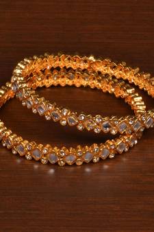 Gold plated gheru stone embellished copper made  bangles BD495