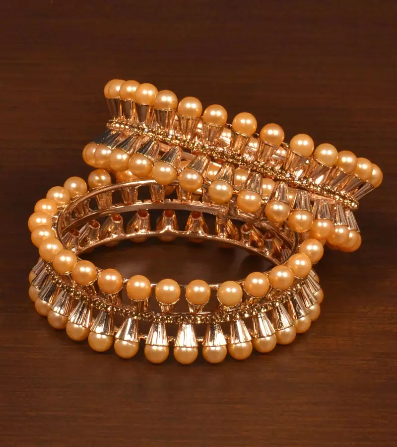 Gold plated pearls embellished antique look glossy bangles BD520