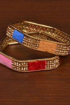 Gold plated feather and zircon embellished bracelet BD523