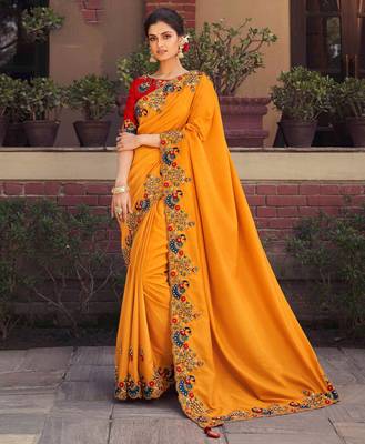 Mustard embroidered georgette saree with blouse 1