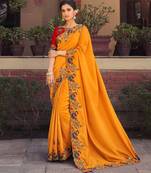 Mustard embroidered georgette saree with blouse