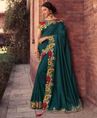 Teal embroidered georgette saree with blouse 1