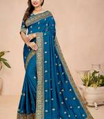 Blue embroidered
 silk saree with blouse