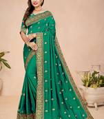 Green embroidered
 silk saree with blouse