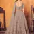 Dusty Rose Pink thread with sequins embroidered net semi stitched party lehenga