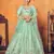 Mint green thread with sequins embroidered net semi stitched wedding lehenga