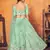 Mint green thread with sequins embroidered net semi stitched wedding lehenga