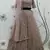 Dusty Rose Pink thread with sequins embroidered net semi stitched party lehenga