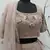 Dusty Rose Pink thread with sequins embroidered net semi stitched party lehenga