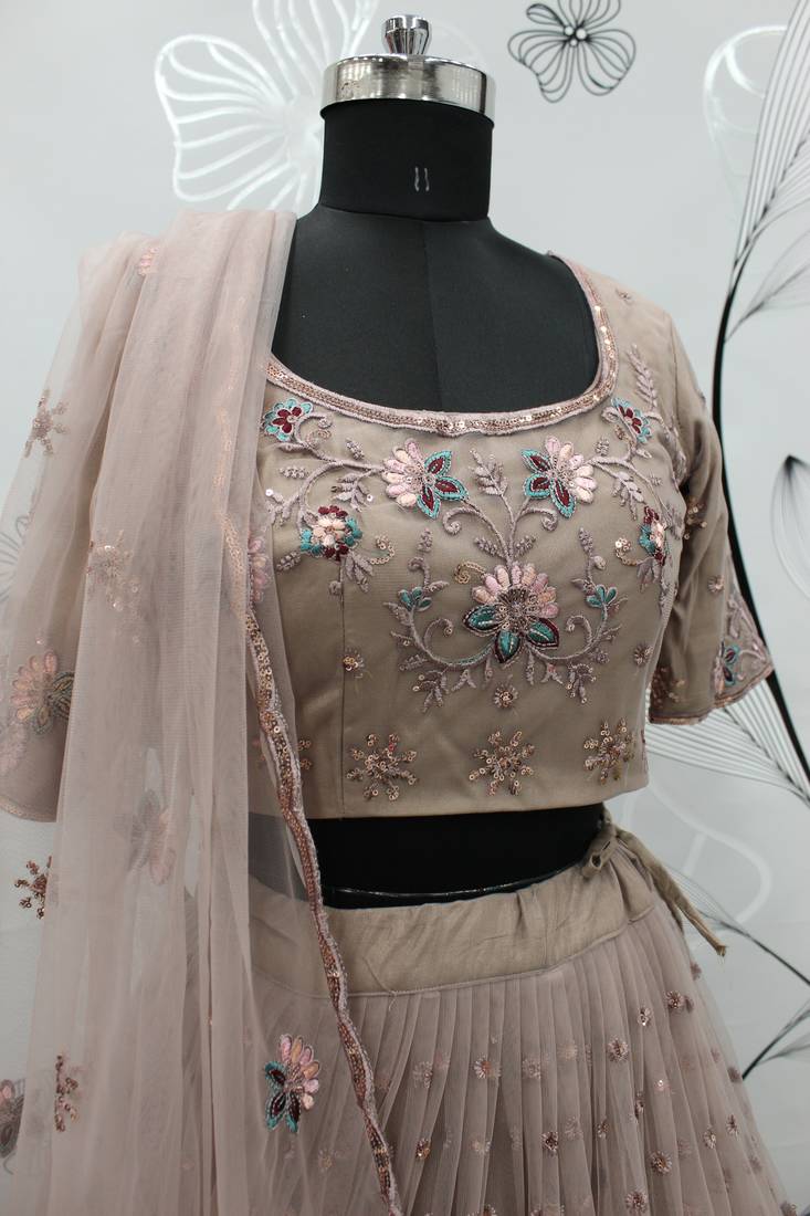 Dusty Rose Pink thread with sequins embroidered net semi stitched party lehenga