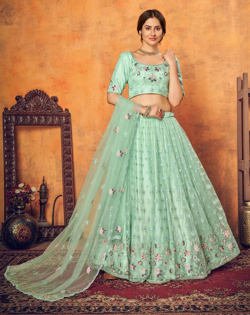 Mint green thread with sequins embroidered net semi stitched wedding lehenga
