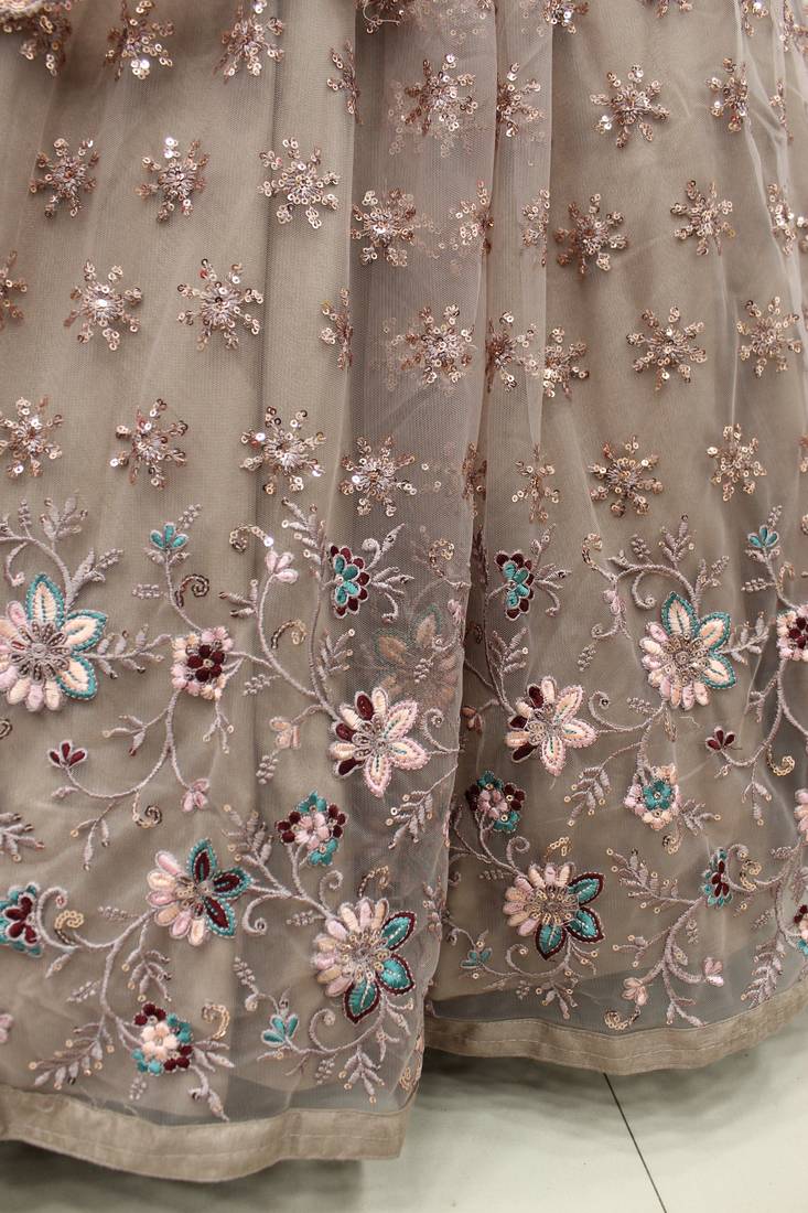 Dusty Rose Pink thread with sequins embroidered net semi stitched party lehenga