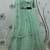 Mint green thread with sequins embroidered net semi stitched wedding lehenga