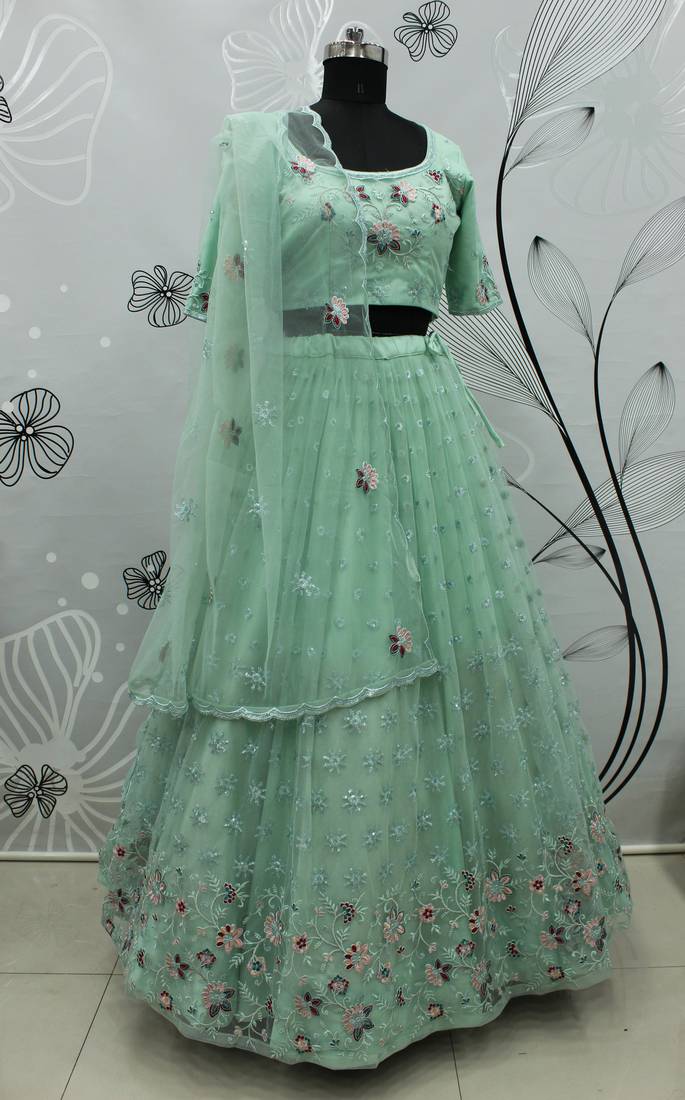 Mint green thread with sequins embroidered net semi stitched wedding lehenga