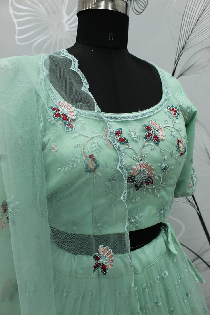 Mint green thread with sequins embroidered net semi stitched wedding lehenga