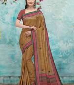 Golden printed tussar silk saree with blouse