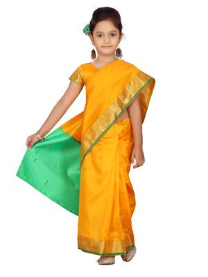 Yellow plain silk stitched saree 5