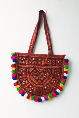 Kutch Embroidered Flower Pattern Banjara Bag With Multicolored Pompoms 1