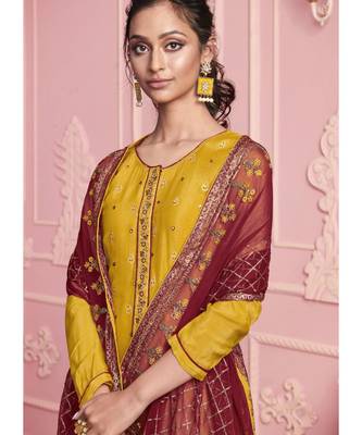 yellow Santoon semi stitched embroidered top & bottom with dupatta 2